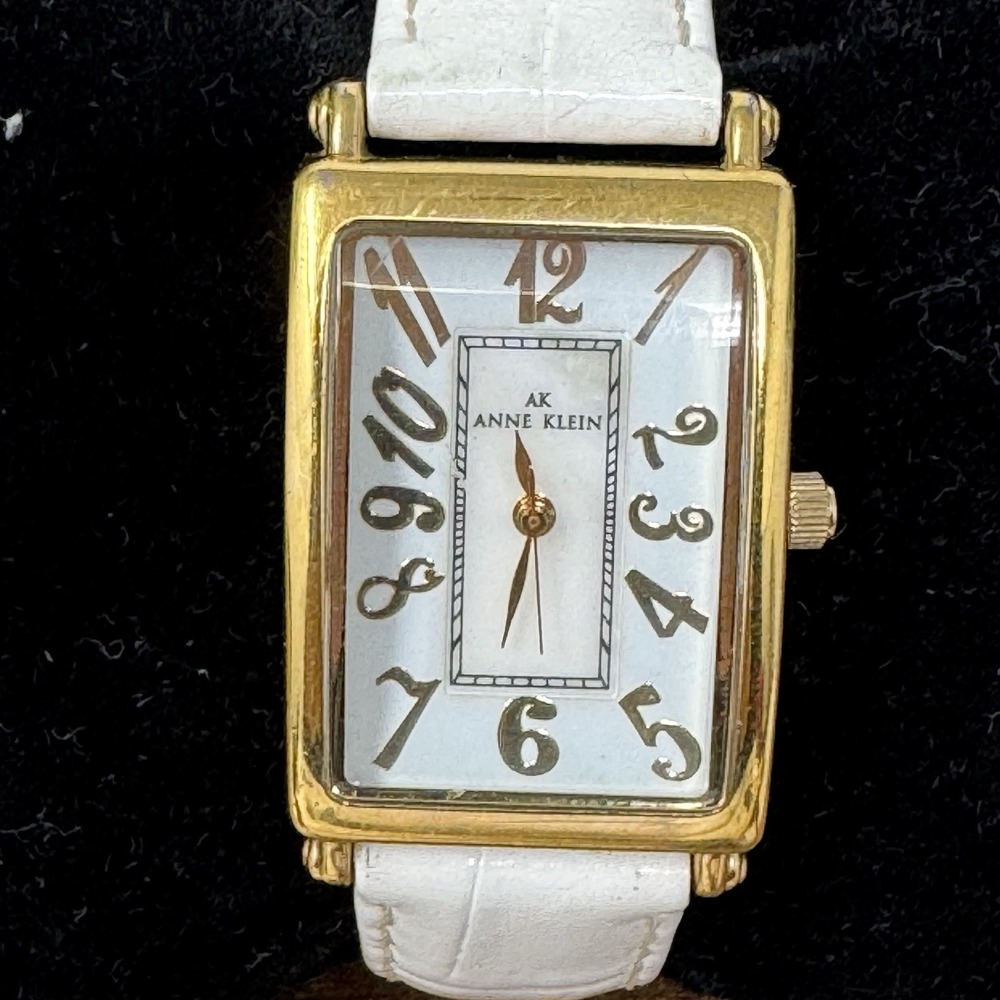 Anne Klein Women's Tank Style Watch 22mm Gold Tone Case Leather Band Adjustable